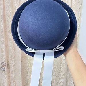 Elegant Blue Hat with White Ribbon